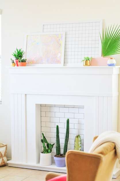 http://www.apartmenttherapy.com/diy-fake-fireplace-facades-faux-mantel-makeovers-236213